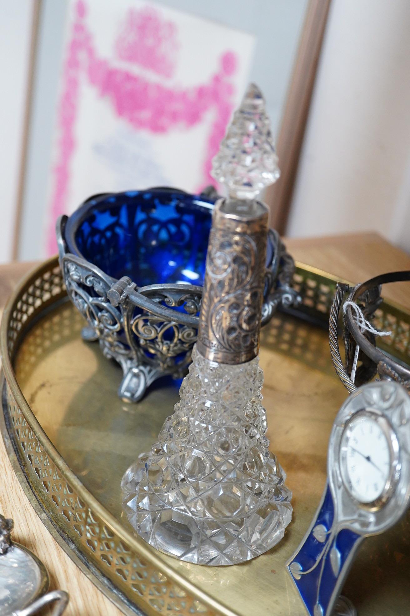 An Art Nouveau style enamelled timepiece by A. E. Williams, a small group of various plated wares and some small silver